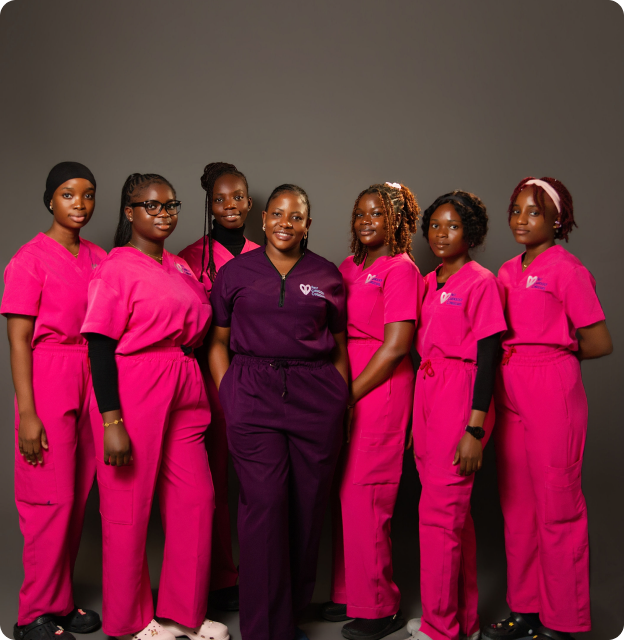 FCC Healthcare team members in pink and purple scrubs