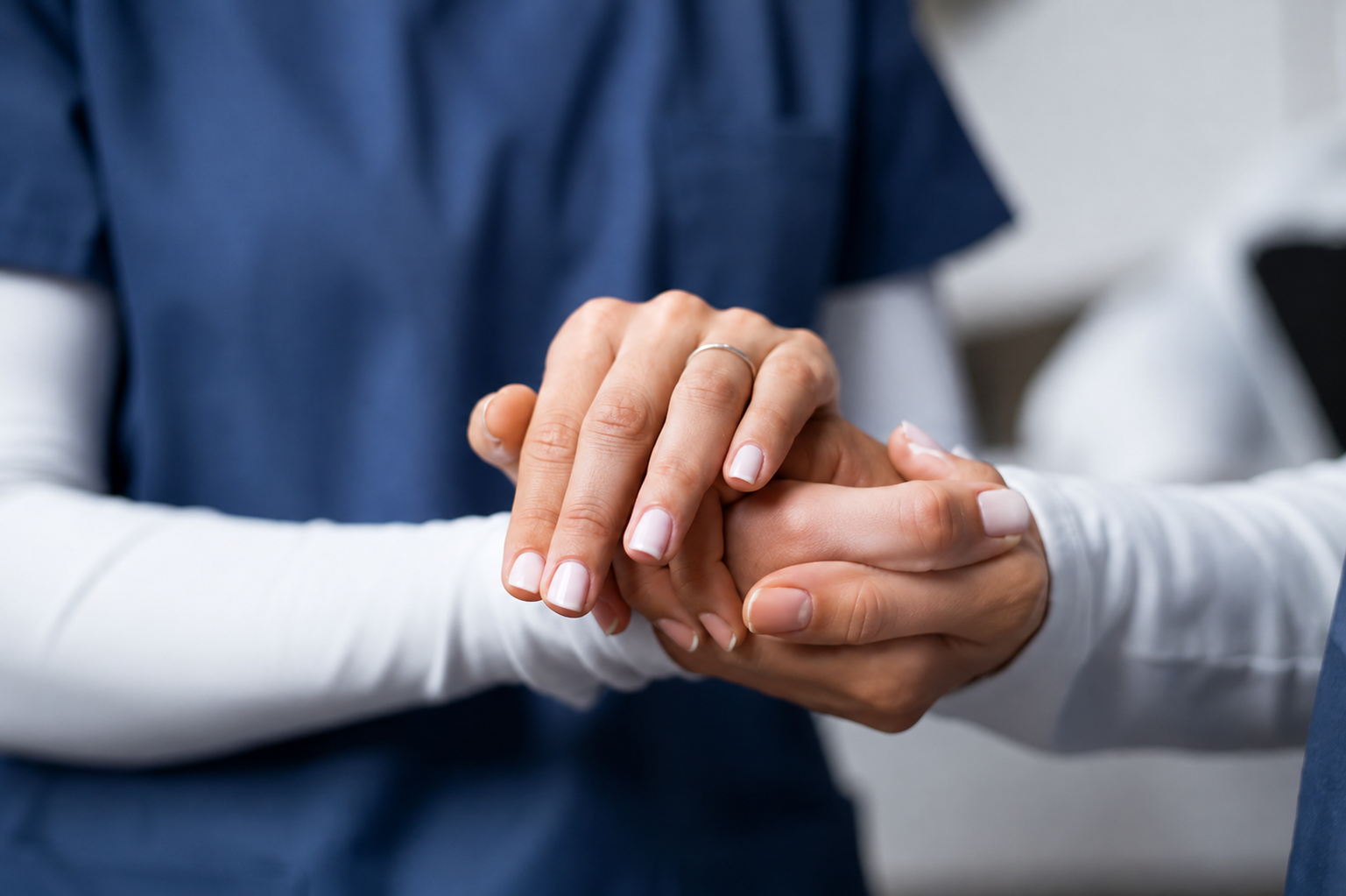 A healthcare professional reassuring a patient