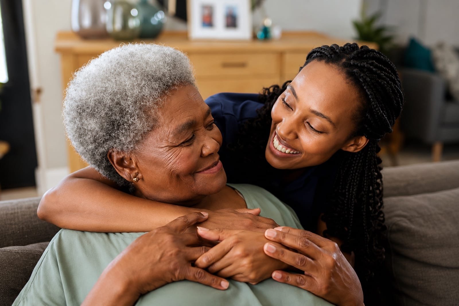 A younger woman embracing an older woman